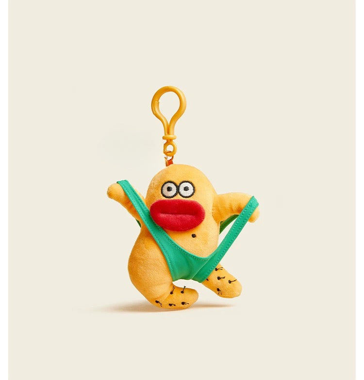 wulibuddy aloha plush bag charm & keychain in a beige background